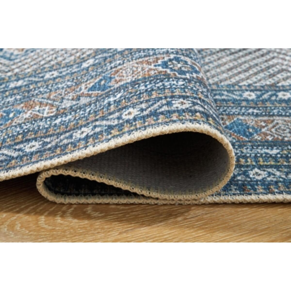 Landler 5'2" x 7'1" Washable Rug - Image 5